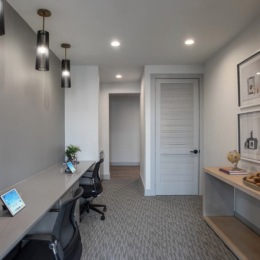 spacious room with computers